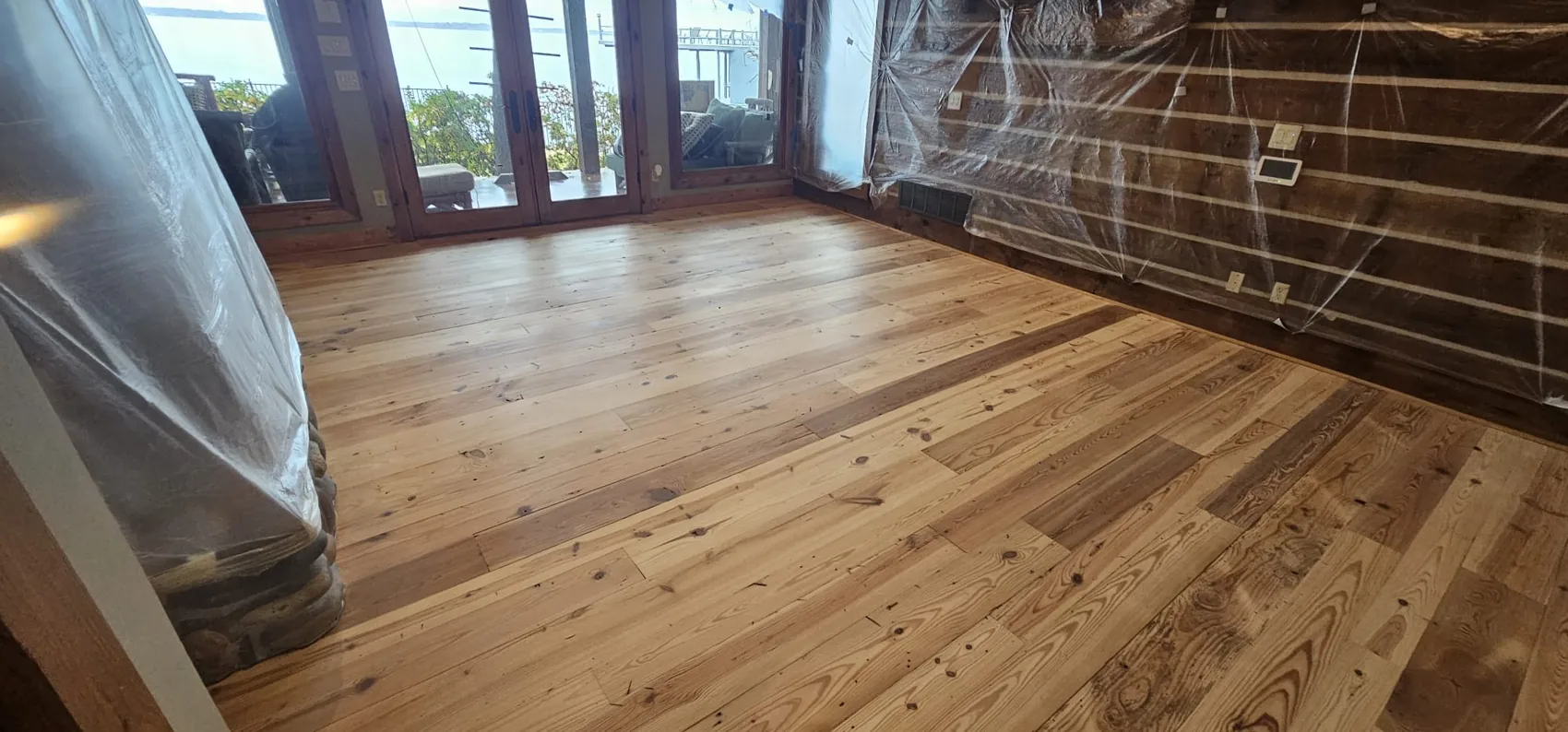 Flooring by brick fireplace